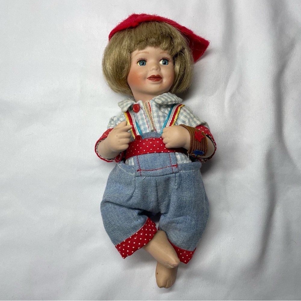 Vintage Porcelain Doll with Red and Blue Outfit - Picture 1 of 4